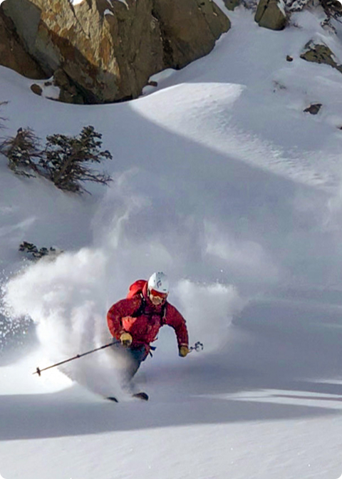 man skiing fresh snow