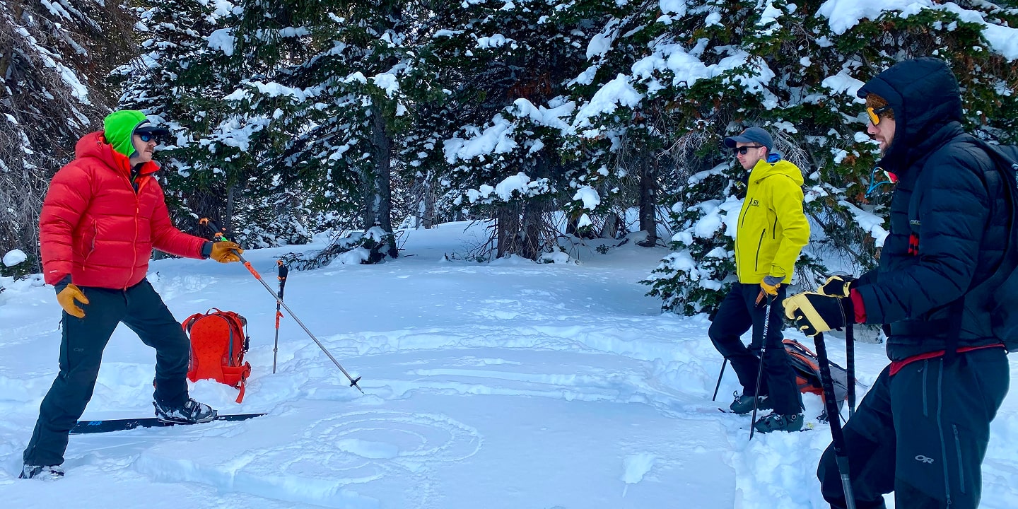 People practicing avalanche safety