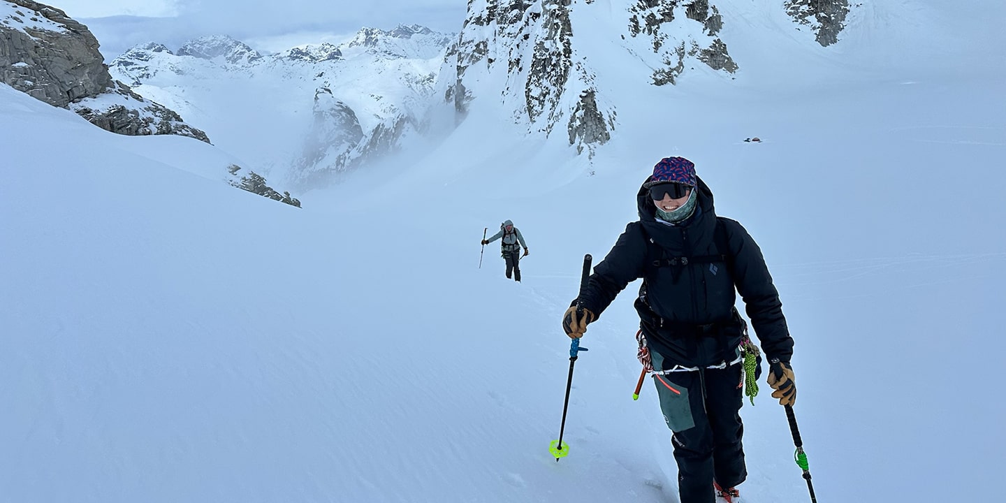 two people guided backcountry skiing