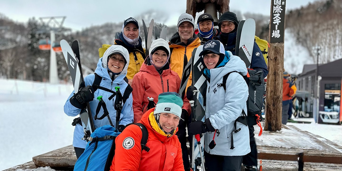 A group of people on a guided ski trip in hokkaido japan
