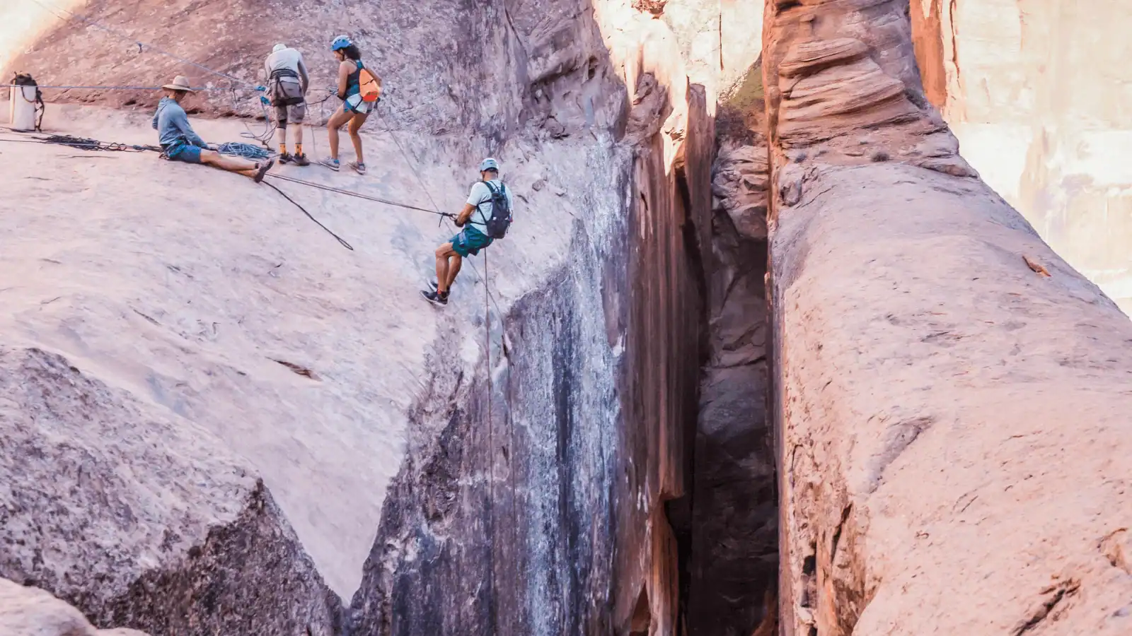 people canyoneering in moab